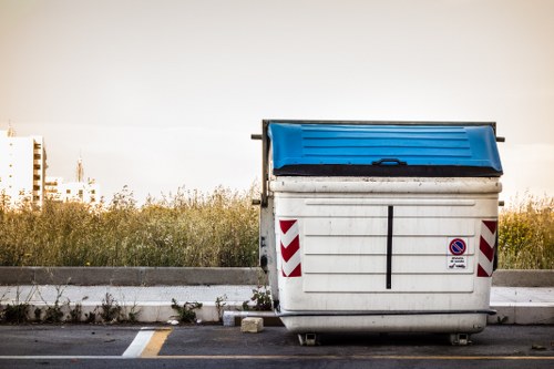 Waste clearance team removing household items in West London